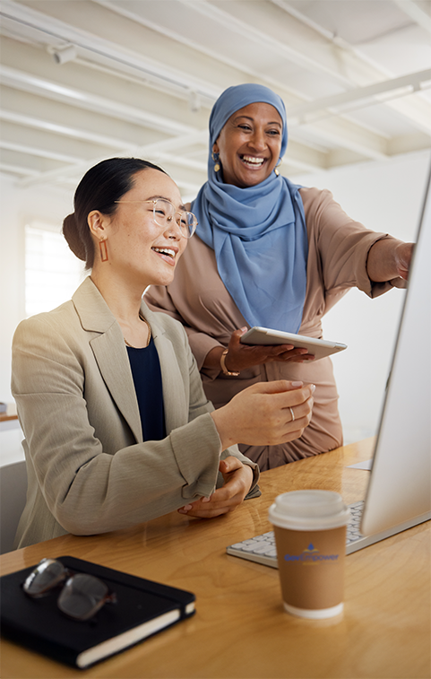 Two ethnic women discussing MBE certification opportunities